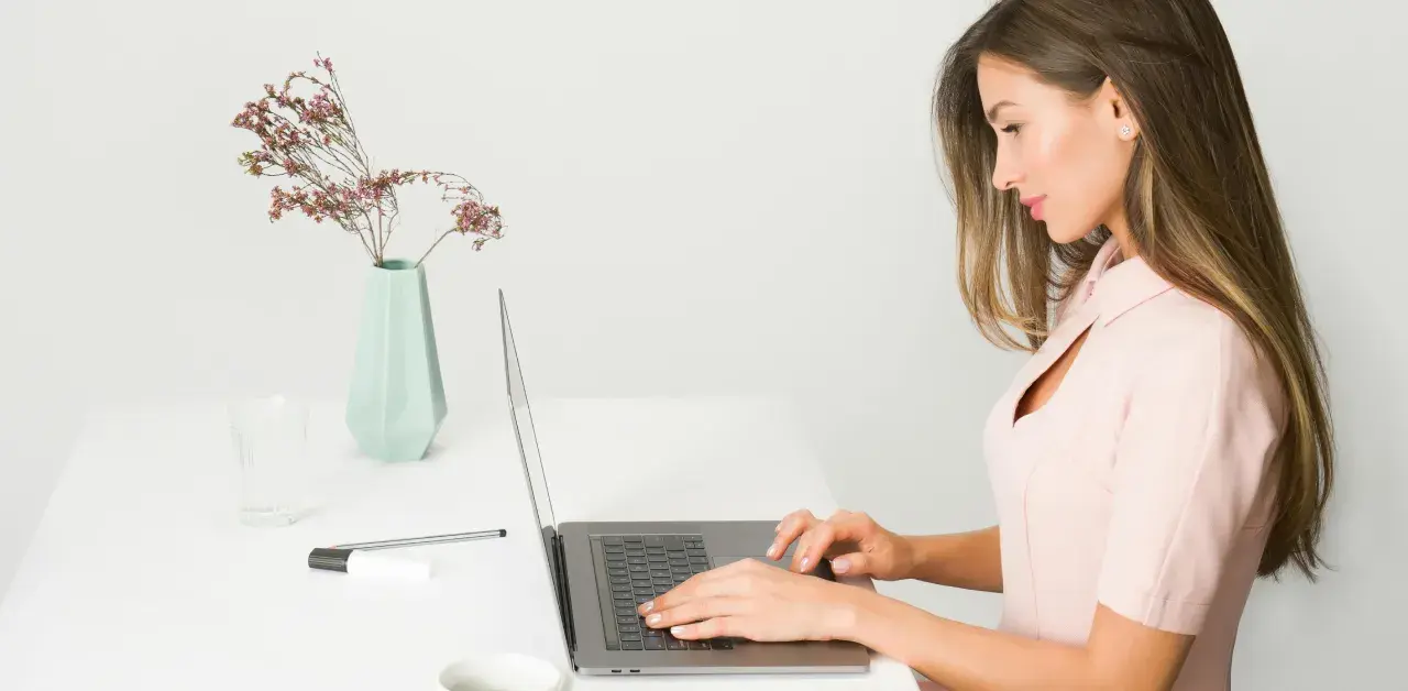 A woman using a laptop - Leading studies show THIS is how you close the deal